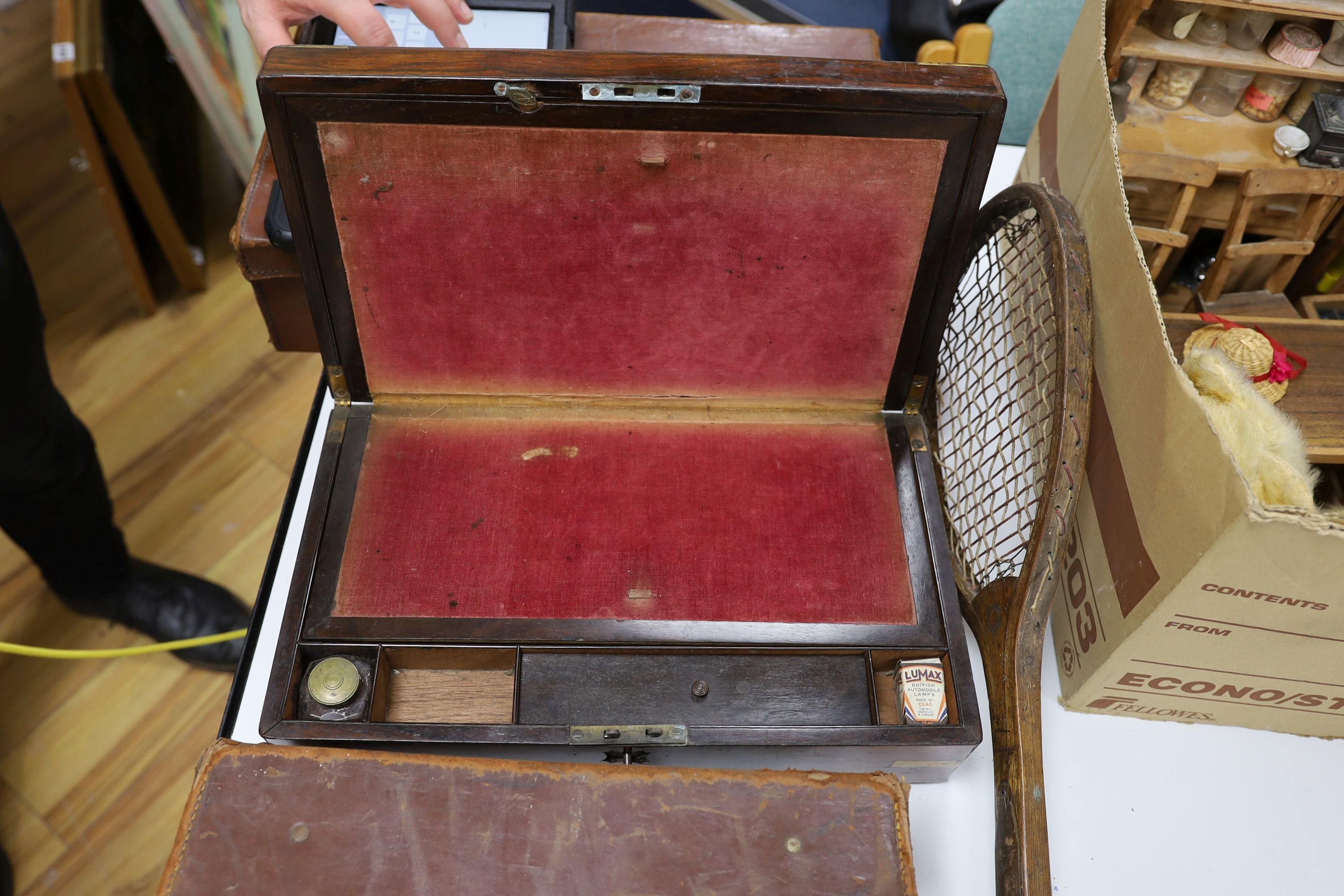 A brass bound writing slope, two small cases of Masonic Regalia and an antique tennis racquet